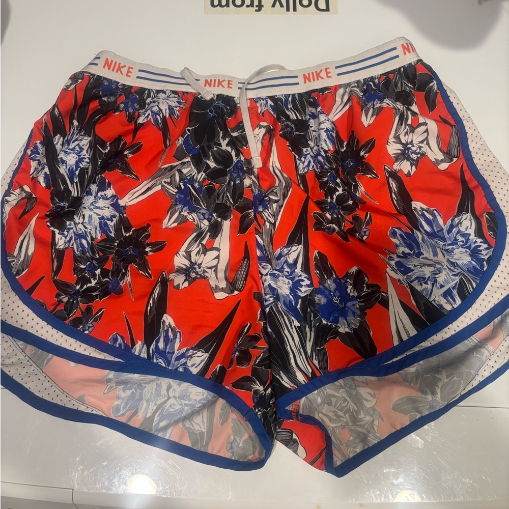 Nike Women's Red Floral Running Shorts with Blue Trim